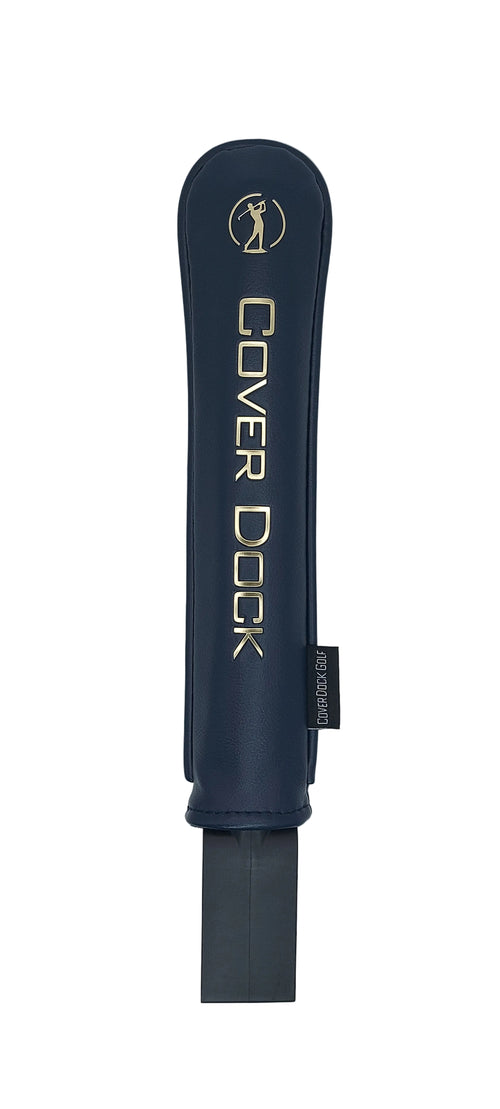 A navy blue golf club headcover with gold lettering that reads 'COVER DOCK' and a gold logo, shown against a light gray background.