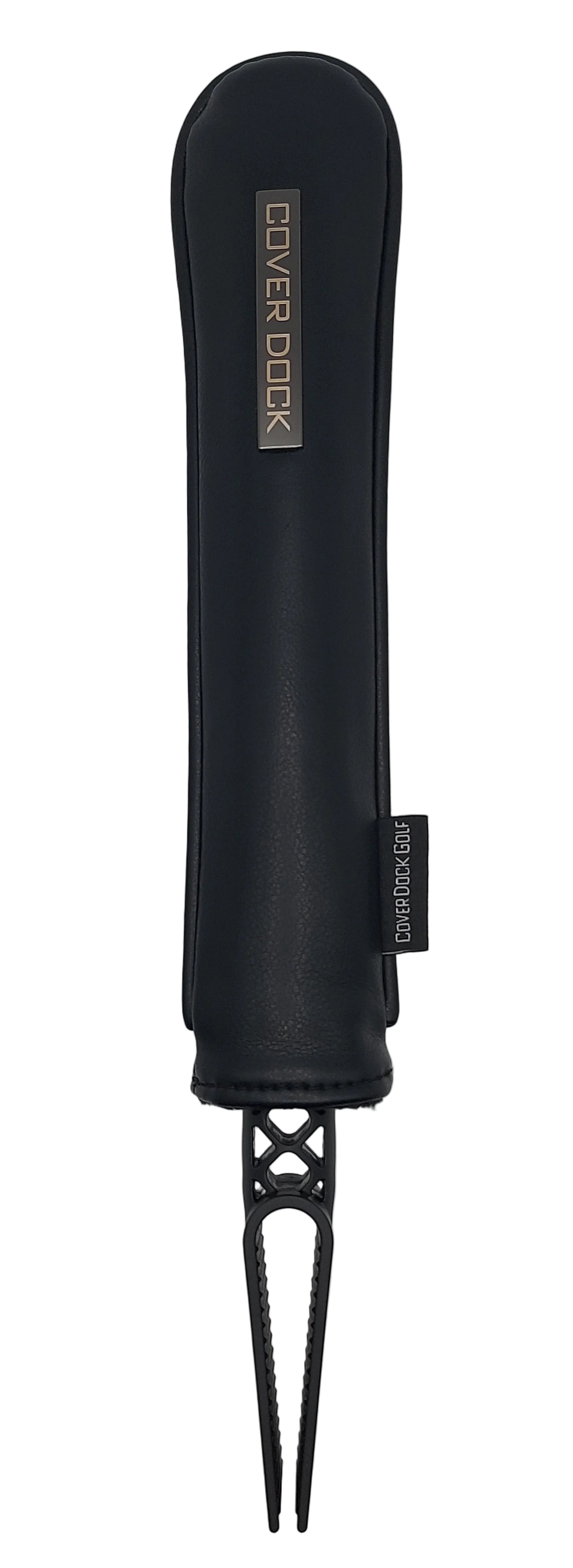 black vegan leather sleeve with a black "COVER DOCK" metal badge. designed to clip/clamp into any golf bag inner grid and secure golf club head cover 